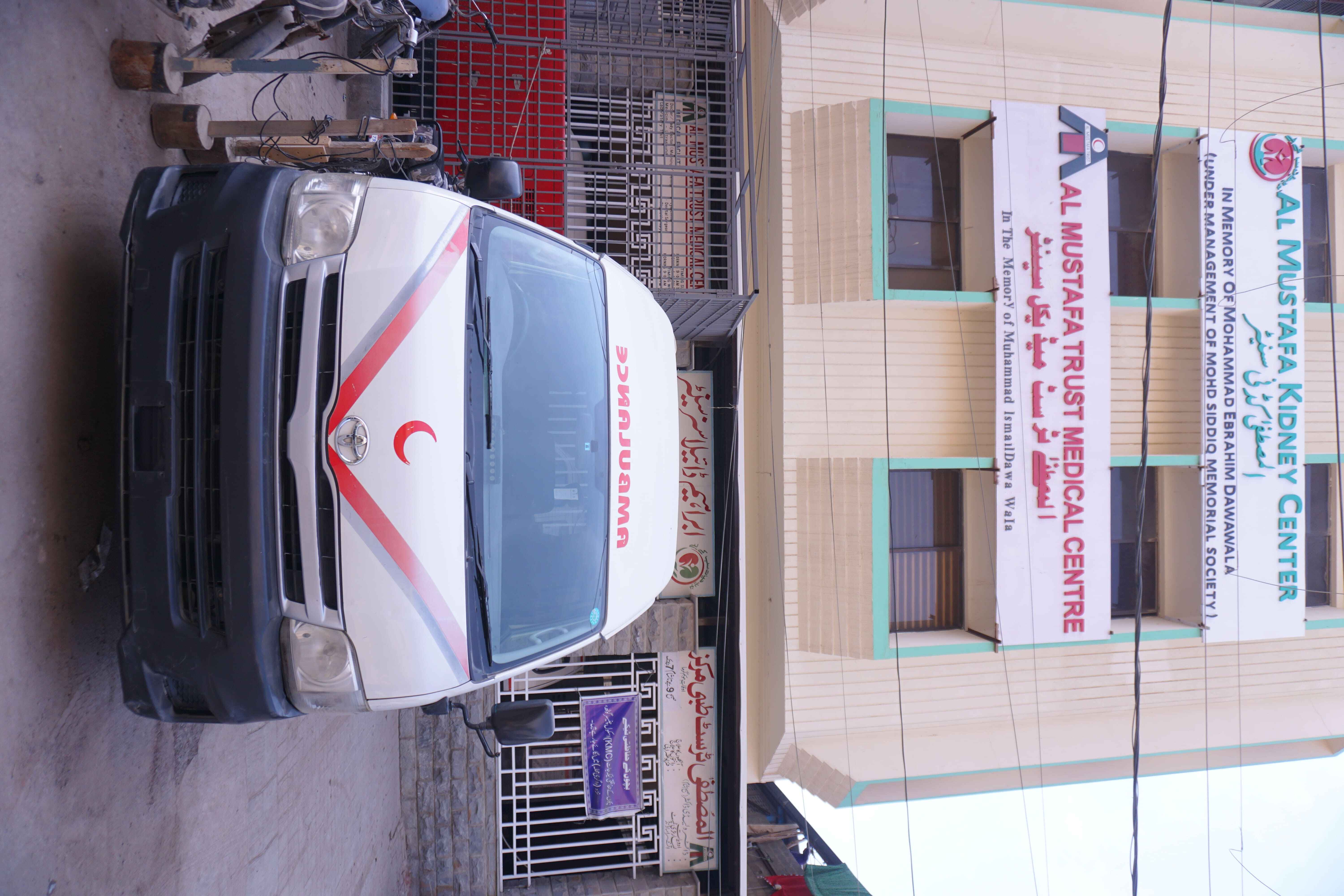 Volunteers distributing food at Al Mustafa Trust food bank